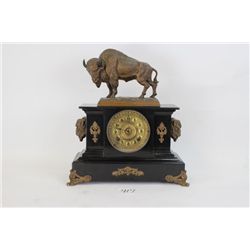 Exceptional Ansonia buffalo statue clock with original clock body in black Japan metal with intricat