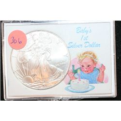 2010 Silver Eagle $1, "Baby's 1st Silver Dollar"