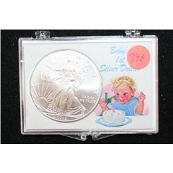 2010 Silver Eagle $1, "Baby's 1st Silver Dollar"