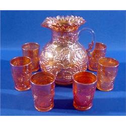 Lot 186_: Marigold Carnival Glass Pitcher and 6 Tumblers