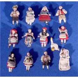 Lot 217_: 12 Miniature Bisque German Dolls