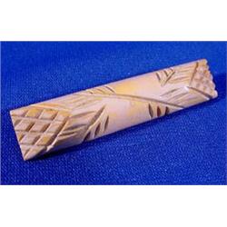 Lot 260_: Carved Bakelite Bar Pin