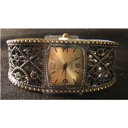 gold and black watch