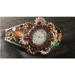 brown round face watch cuff bracelet