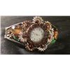 Image 1 : brown round face watch cuff bracelet