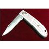 Image 1 : 376. Partial Serrated Lock Blade Knife. Metal handle.