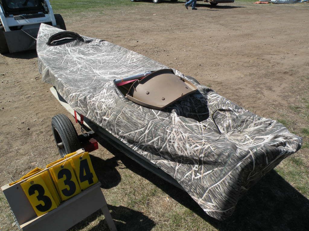 2 seat Canoe w/paddles, seats, camo cover, & trailer