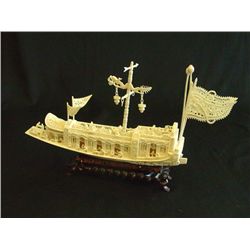 Chinese carved bone "Boat" on stand