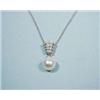 A swirl form white gold pendant decorated wit...