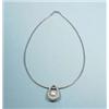 An unusual platinum and diamond pendant set w...