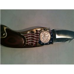 The American historical Society Collector Coin Knife has American flag motif