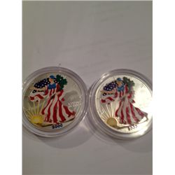 TWO .999 PURE SILVER ONE TROY OZ PAINTED AMERICAN EAGLES