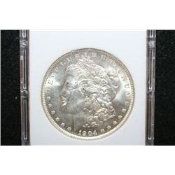 1904-O Silver Morgan $1, MCPCG Graded MS63