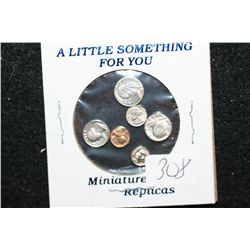 A Little Something For You; Miniature Replicas of US Coins to include Eisenhower $1, Kennedy Half, W