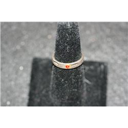 Ring W/Red Gemstone