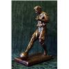 Image 1 : A large patinated metal figure of a footballe...