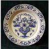 Image 1 : An antique Delft blue and white circular char...