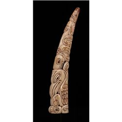 Elsie John Carved Walrus Tusk Depicting Shaman Holding Whale and a Raven with Faceted Garnet Inset E