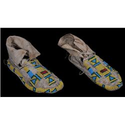 Pair of Northern Cheyenne Beaded Moccasins with Geometric Design and Parfleche Soles ca. 1870  9 1/2