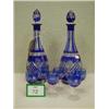 Image 1 : Two Bohemian blue cut glass decanters with si...