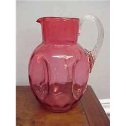 Early cranberry jug with applied handle and g...