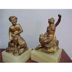 Pair of bronze figures mounted on marble....