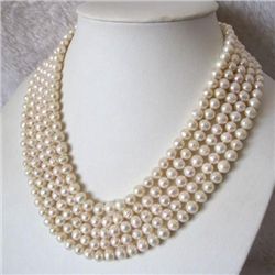 Stunning WHITE AKOYA PEARL NECKLACE measures 100 in