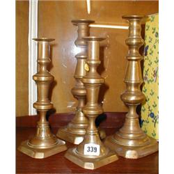 Two pairs of C19th brass candlesticks...