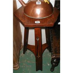 A late C19th Arts and Crafts oak table wit...