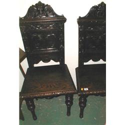 Two C19th oak hall/side chairs with heavy ...