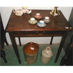 A late C18th/early C19th oak side table wi...