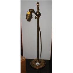 A brass adjustable table lamp...