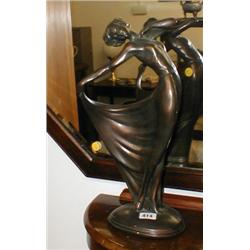 A plaster Art Deco style figurine...