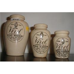 Three graduated stoneware advertising Jars...