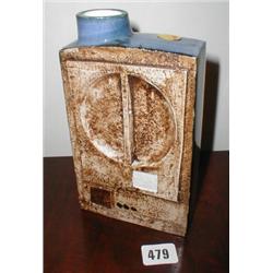 A Troika offset chimney vase with raised d...