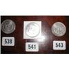 An uncirculated silver one dollar coin 188...