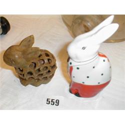 A soapstone rabbit together with a decorat...