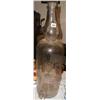 A large C19th glass spirit bottle with tap...