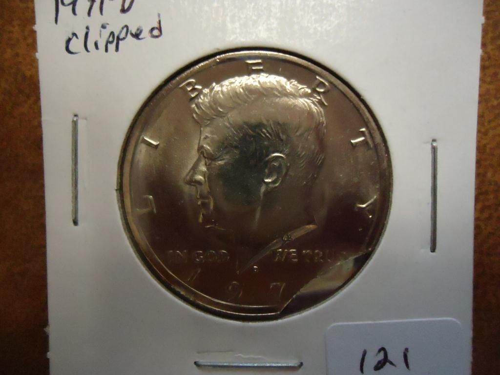 ERROR 1971 D KENNEDY HALF DOLLAR CLIPPED UNC error-1971-d-kennedy-half-dollar-clipped-unc