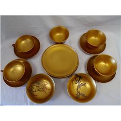 Gold Lacquer Tea Cups and Bowls Set.