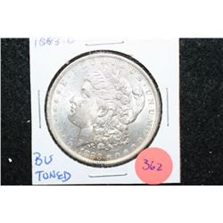 1883-O Silver Morgan $1; BU Toned