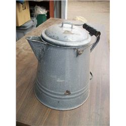 Antique enamel coffee pot .