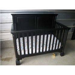 Dark wood baby crib 58w x 47t x 31d