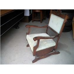 Antique rocking chair .