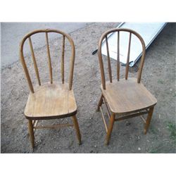 2 antique oak chairs .