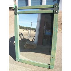Lg green framed mirror with iron connectors .