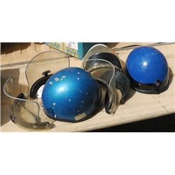 2 Motor Cycle Helmets .