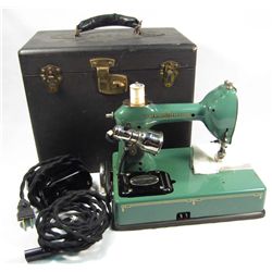 VINTAGE GENERAL ELECTRIC PORTABLE SEWING MACHINE IN CASE