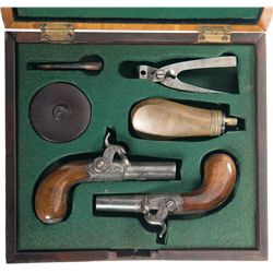 Cased Pair of Lepage Percussion Pistols with Accessories
