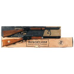 Two Boxed Lever Action Long Guns